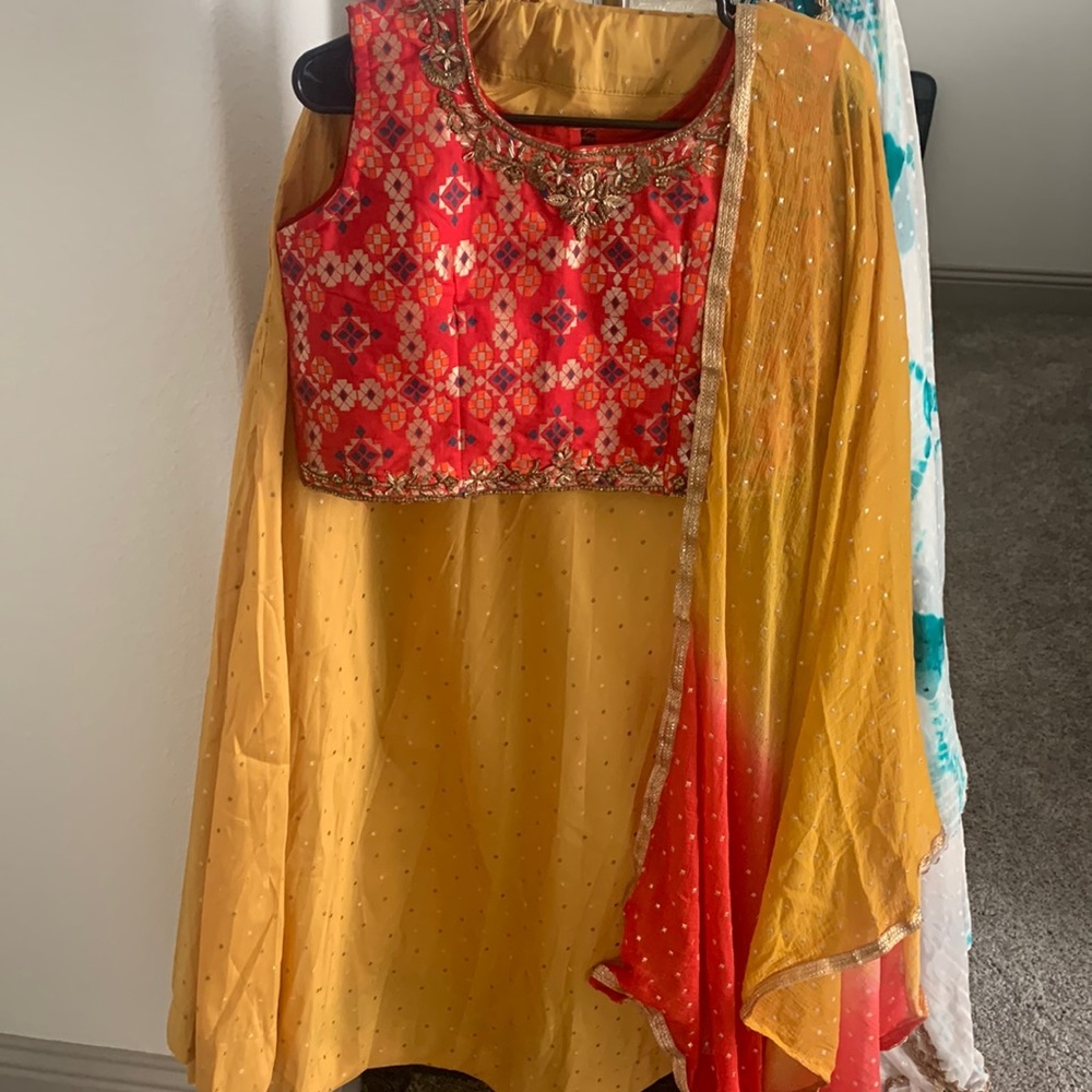 Brand new silk lehenga with embroidered choli and georgette chunni.